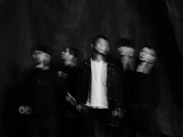 Musical band Jambinai blurry in black & white