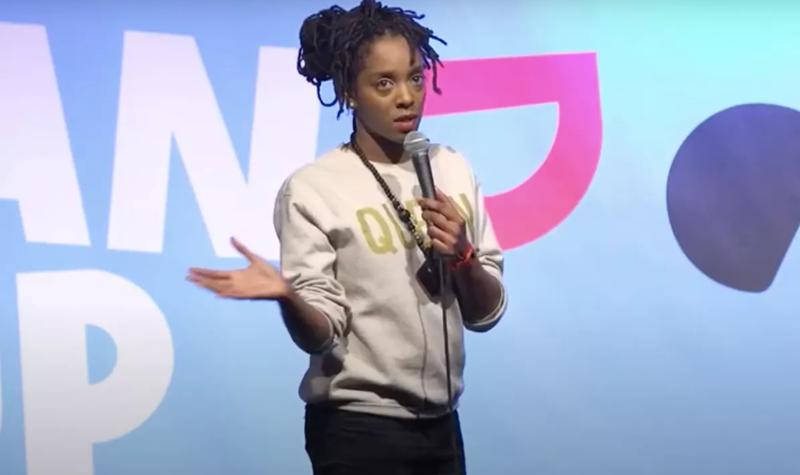 Comedian Athena Kugblenu performs stand-up on stage