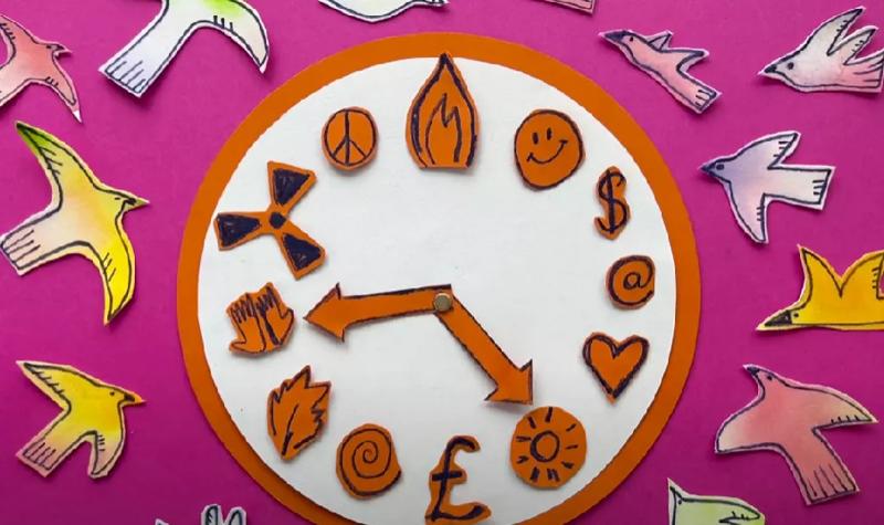 An orange clock on a pink background with paper birds flying