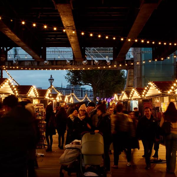 image of the Southbank Christmas market full of customers at stalls